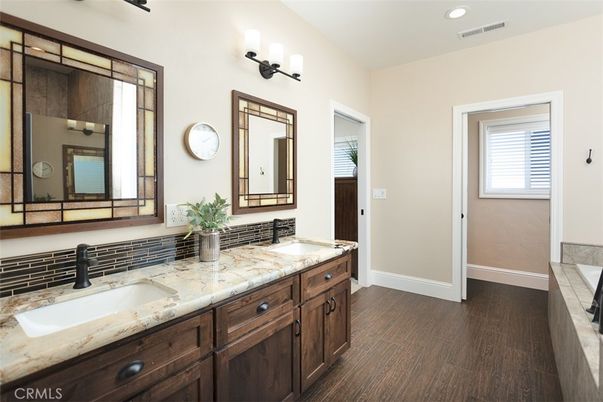 Bathroom, Dual Sink Vanities, Interior, Recessed Lighting, Wood Texture Flooring