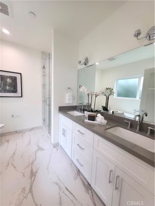 Bathroom, Dual Sink Vanities, Glass Shower, Interior, Marble, Recessed Lighting