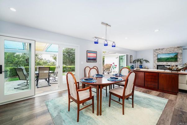 Dining room, Fireplace, Interior, Pendant Lights, Recessed Lighting, Stone Walls, Wood Texture Flooring