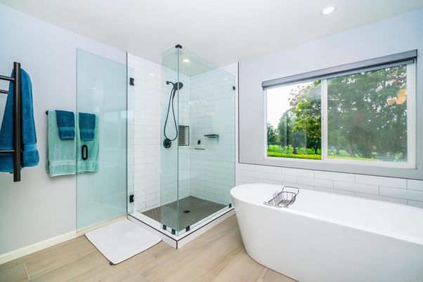 Bathroom, Free Standing Baths, Glass Shower, Interior, Recessed Lighting, Wood Texture Flooring