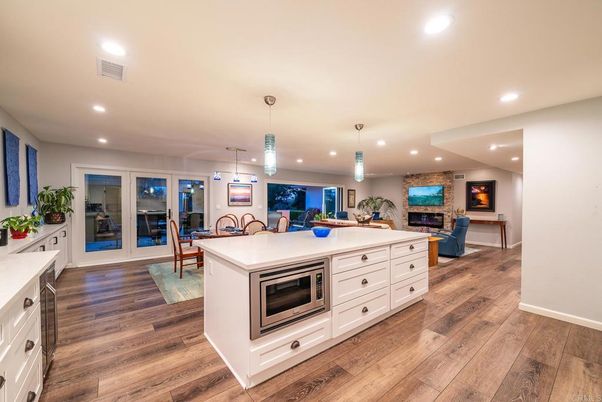 Dining room, Fireplace, Interior, Kitchen, Living room, Pendant Lights, Recessed Lighting, Wood Texture Flooring