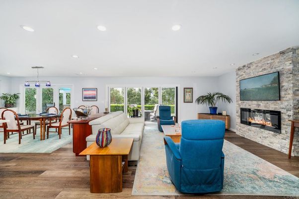 Dining room, Fireplace, Interior, Living room, Pendant Lights, Recessed Lighting, Stone Walls, Wood Texture Flooring