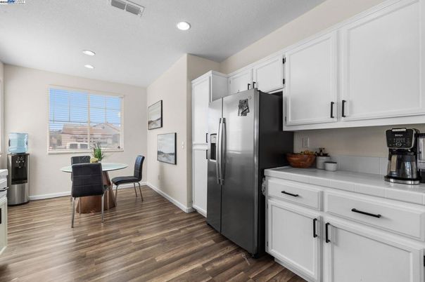 Dining room, Interior, Kitchen, Recessed Lighting, Tile Countertops, Wood Texture Flooring