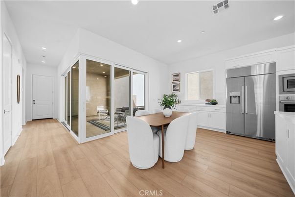 Dining room, Interior, Kitchen, Recessed Lighting, Stainless Steel Appliances, Wood Texture Flooring