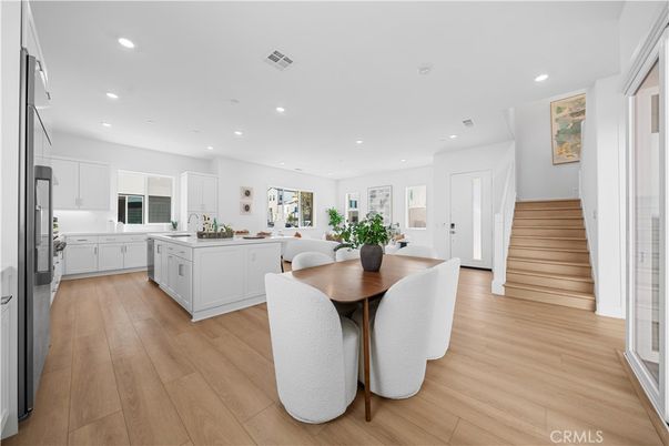 Dining room, Interior, Kitchen, Recessed Lighting, Stainless Steel Appliances, Wood Texture Flooring