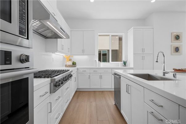 Interior, Kitchen, Recessed Lighting, Stainless Steel Appliances, Wood Texture Flooring