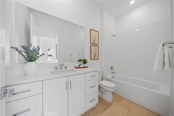 Bathroom, Dual Sink Vanities, Interior, Recessed Lighting, Wood Texture Flooring