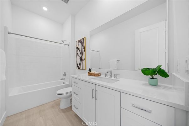 Bathroom, Dual Sink Vanities, Interior, Recessed Lighting, Wood Texture Flooring