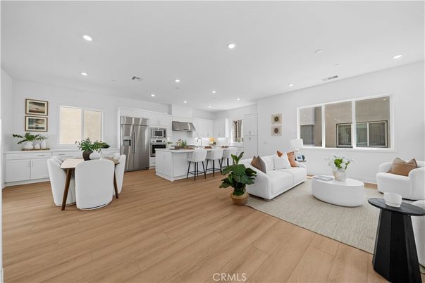 Dining room, Interior, Kitchen, Living room, Recessed Lighting, Stainless Steel Appliances, Wood Texture Flooring