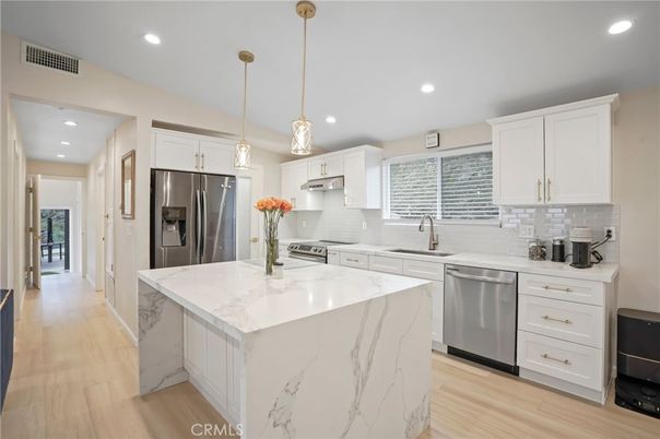 Interior, Kitchen, Pendant Lights, Recessed Lighting, Stainless Steel Appliances, Wood Texture Flooring
