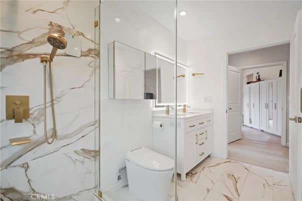 Bathroom, Glass Shower, Interior, Marble, Marble Walls, Recessed Lighting, Wood Texture Flooring