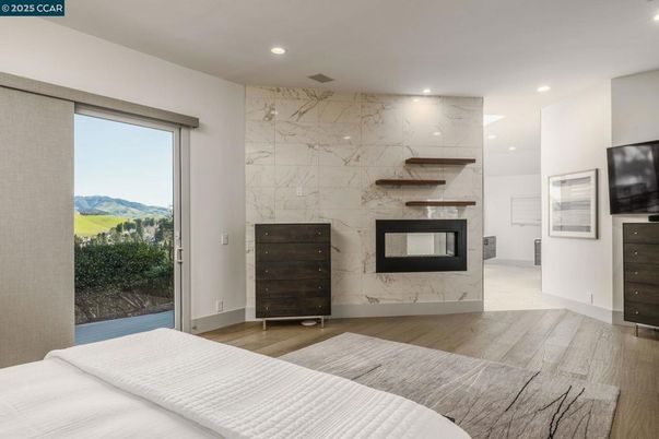 Bedroom, Fireplace, Interior, Marble Walls, Recessed Lighting, Wood Texture Flooring