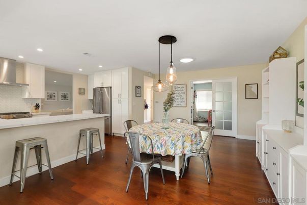 Dining room, Interior, Kitchen, Pendant Lights, Recessed Lighting, Stainless Steel Appliances, Wood Texture Flooring