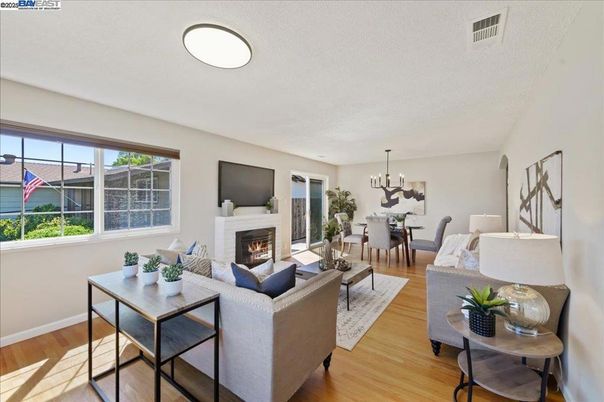 Chandelier, Dining room, Fireplace, Interior, Living room, Pendant Lights, Wood Texture Flooring