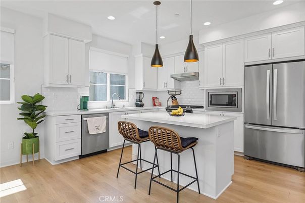 Interior, Kitchen, Pendant Lights, Recessed Lighting, Stainless Steel Appliances, Wood Texture Flooring