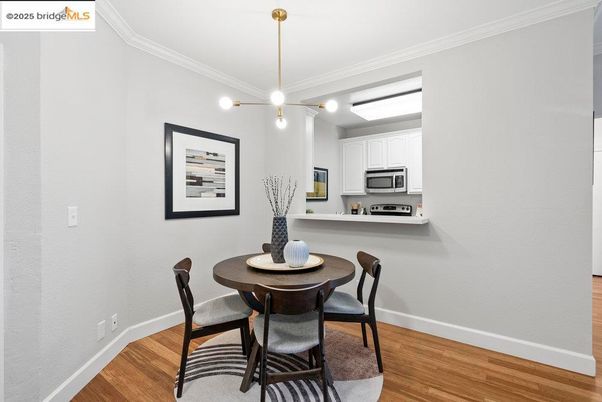 Dining room, Interior, Kitchen, Pendant Lights, Stainless Steel Appliances, Wood Texture Flooring