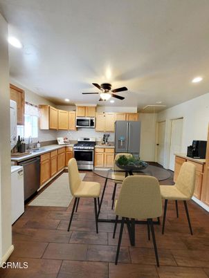 Dining room, Interior, Kitchen, Recessed Lighting, Stainless Steel Appliances, Wood Texture Flooring