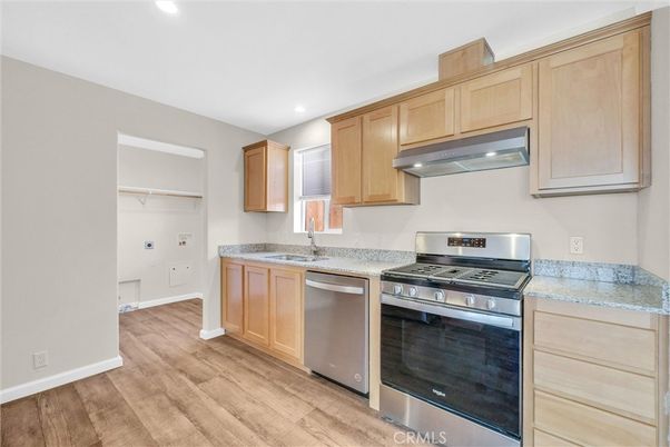 Interior, Kitchen, Recessed Lighting, Stainless Steel Appliances, Wood Texture Flooring