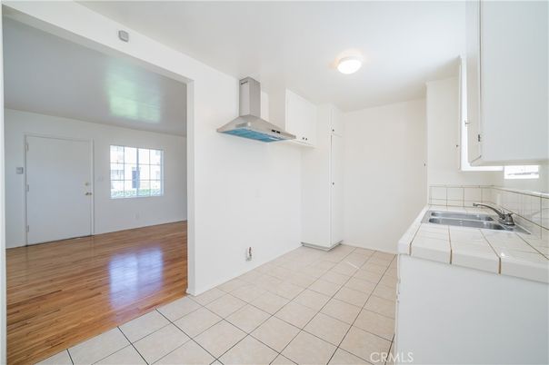 Interior, Kitchen, Tile Countertops, Wood Texture Flooring