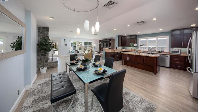 Dining room, Interior, Kitchen, Pendant Lights, Recessed Lighting, Stainless Steel Appliances, Wood Texture Flooring