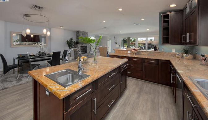 Dining room, Interior, Kitchen, Pendant Lights, Recessed Lighting, Stainless Steel Appliances, Wood Texture Flooring