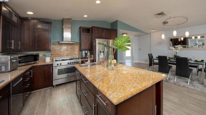 Dining room, Interior, Kitchen, Pendant Lights, Recessed Lighting, Stainless Steel Appliances, Wood Texture Flooring