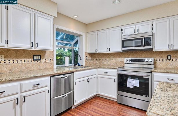 Interior, Kitchen, Recessed Lighting, Stainless Steel Appliances, Wood Texture Flooring