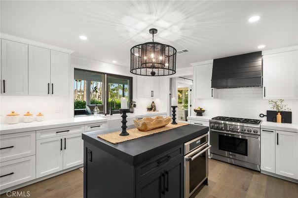 Chandelier, Interior, Kitchen, Recessed Lighting, Stainless Steel Appliances, Wood Texture Flooring