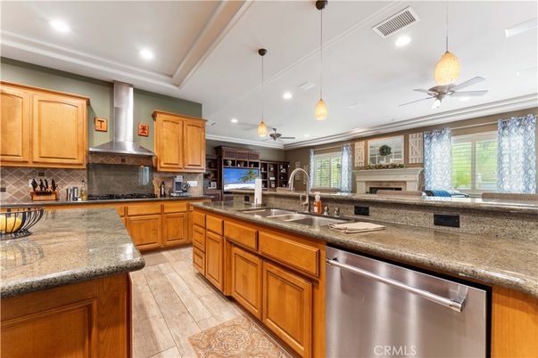 Fireplace, Interior, Kitchen, Pendant Lights, Recessed Lighting, Stainless Steel Appliances, Wood Texture Flooring