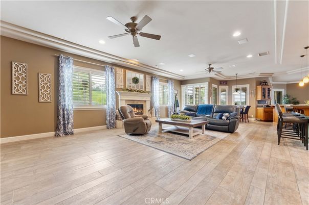 Dining room, Fireplace, Interior, Living room, Pendant Lights, Recessed Lighting, Wood Texture Flooring
