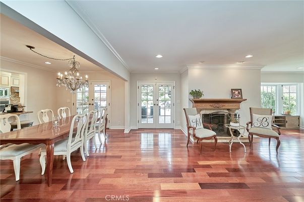 Chandelier, Dining room, Fireplace, Interior, Recessed Lighting, Wood Texture Flooring