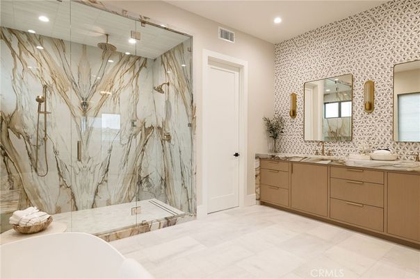 Bathroom, Dual Sink Vanities, Free Standing Baths, Glass Shower, Interior, Marble Walls, Recessed Lighting