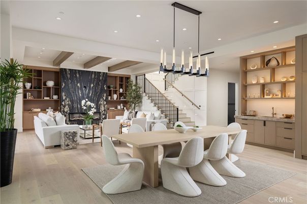 Dining room, Fireplace, Interior, Living room, Pendant Lights, Recessed Lighting, Wood Texture Flooring