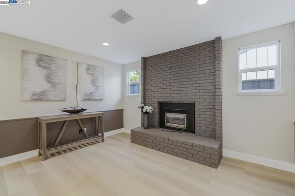 Fireplace, Interior, Recessed Lighting, Stone Walls, Wood Texture Flooring