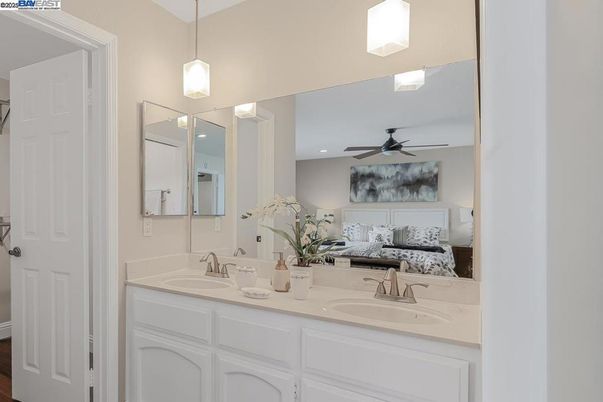 Bathroom, Bedroom, Dual Sink Vanities, Interior, Pendant Lights, Recessed Lighting, Wood Texture Flooring