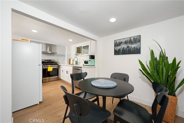Dining room, Interior, Kitchen, Recessed Lighting, Stainless Steel Appliances, Wood Texture Flooring