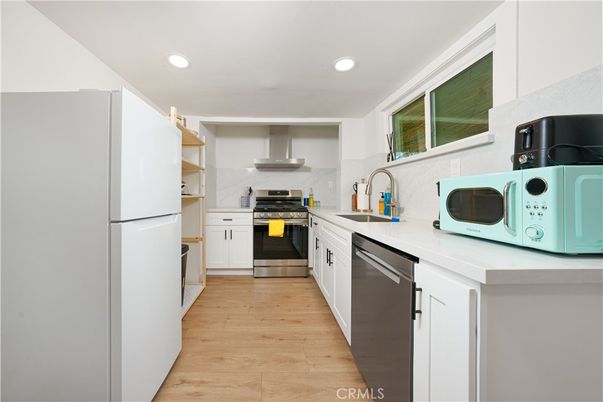 Interior, Kitchen, Recessed Lighting, Stainless Steel Appliances, Wood Texture Flooring