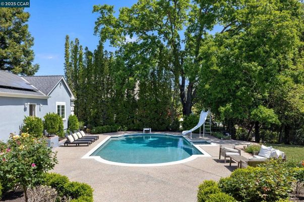 Exterior, Pool, Solar Panels