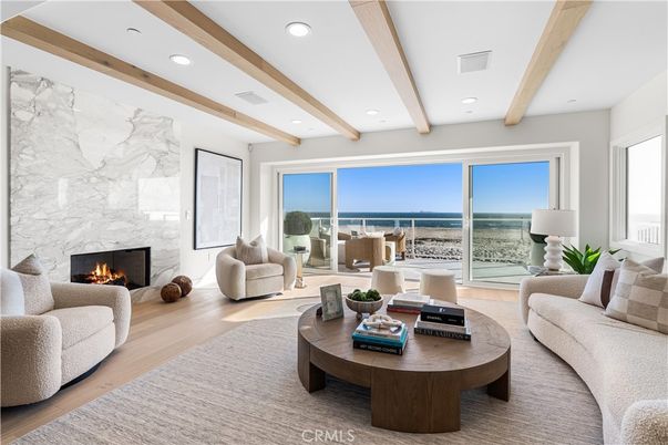 Fireplace, Interior, Living room, Marble Walls, Recessed Lighting, Water, Wooden Beams, Wood Texture Flooring