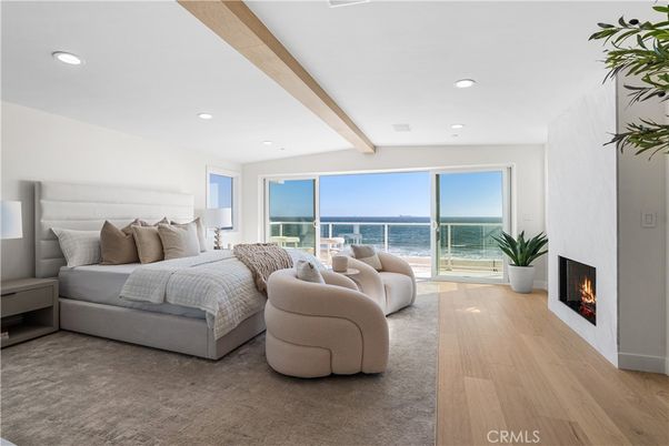 Bedroom, Fireplace, Interior, Recessed Lighting, Water, Wood Texture Flooring
