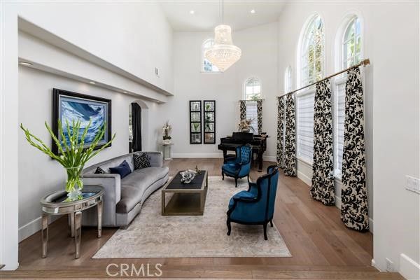 Chandelier, Interior, Living room, Piano, Recessed Lighting, Wood Texture Flooring