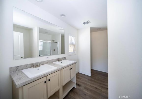 Bathroom, Dual Sink Vanities, Interior, Recessed Lighting, Wood Texture Flooring