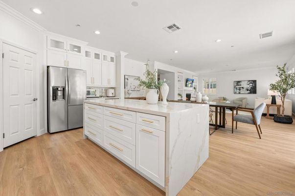 Dining room, Interior, Kitchen, Recessed Lighting, Stainless Steel Appliances, Wood Texture Flooring