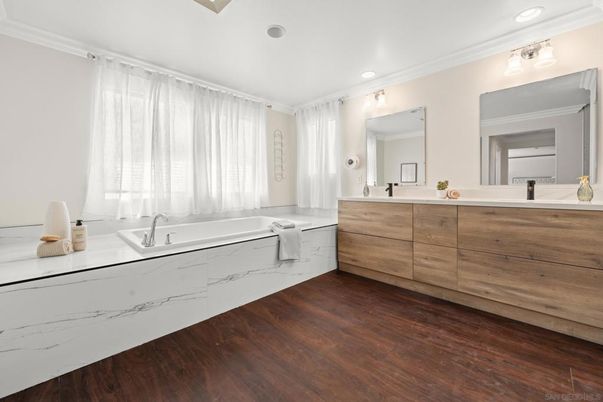 Bathroom, Dual Sink Vanities, Interior, Recessed Lighting, Wood Texture Flooring