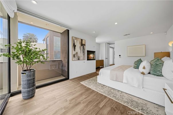 Bedroom, Fireplace, Interior, Recessed Lighting, Wood Texture Flooring