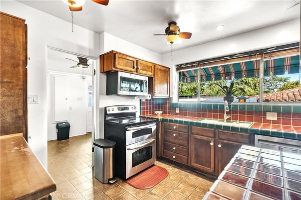 Interior, Kitchen, Recessed Lighting, Tile Countertops