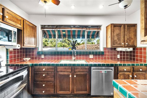 Interior, Kitchen, Recessed Lighting, Stainless Steel Appliances, Tile Countertops