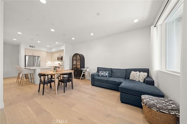 Dining room, Interior, Kitchen, Living room, Recessed Lighting, Stainless Steel Appliances, Wood Texture Flooring