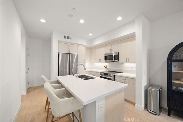 Interior, Kitchen, Recessed Lighting, Stainless Steel Appliances, Wood Texture Flooring