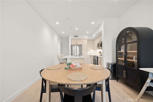Dining room, Interior, Kitchen, Recessed Lighting, Stainless Steel Appliances, Wood Texture Flooring